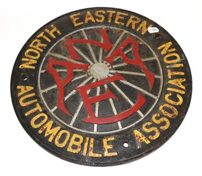 Lot 2046 - A North Eastern Automobile Association Cast Iron Circular Wall Plaque, early 20th century, the...