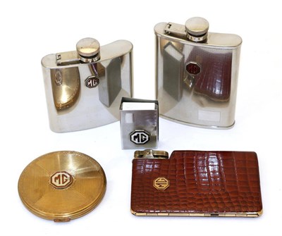 Lot 2052 - MG Automobilia, to include two stainless steel hip flasks with red enamel MG badge, a brass...