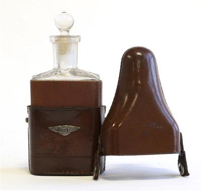 Lot 1003 - A 1920s Bentley Lady's Travelling Perfume Bottle, with brown leather outer case containing...