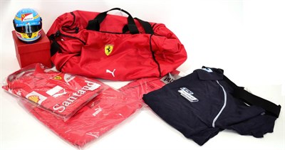 Lot 1010 - A Ferrari F1 Team Kit Bag, comprising soft holdall numbered 048, a boxed miniature racing...