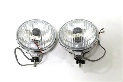 Lot 1017 - A Pair of Lucas CFT/CLR12 Chrome Plated and Black Painted 5 1/2in Diameter Head Lamps  Buyer's...