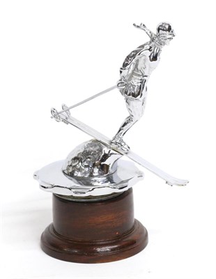 Lot 1086 - A 1931 Riley Ski Lady Chrome Car Mascot, mounted on a threaded radiator cap and circular wooden...