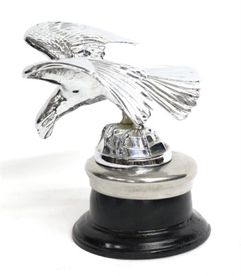 Lot 1087 - A 1933 Alvis Eagle Car Mascot, with outstretched wings standing on a rocky base mounted on a...