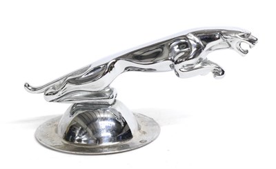 Lot 1097 - A Chrome on Brass Car Mascot in the form of a Jaguar, mounted on a circular cap, 9.5cm high...