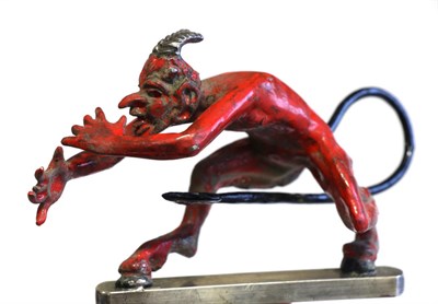 Lot 1111 - A Rare Red Devil Motorhead Car Mascot, early 20th century, painted in red and black enamels...