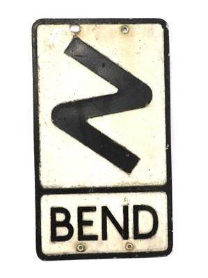 Lot 1128 - A Metal Single-Sided Road Sign: Bend, with four drill holes, 53.5cm by 30cm  Buyer's premium of 20%