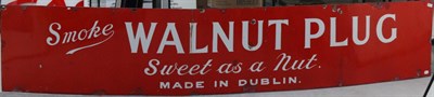 Lot 1133 - A Red Enamel Single-Sided Advertising Sign: Smoke Walnut Plug Sweet as a Nut, Made in Dublin,...