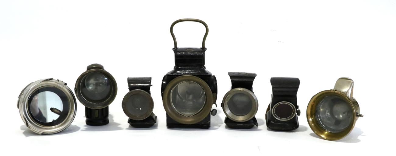 Lot 10 - Seven Early 20th Century Motorcycle Lamps, to include a Joseph Lucas No.354 brass lamp, lens...