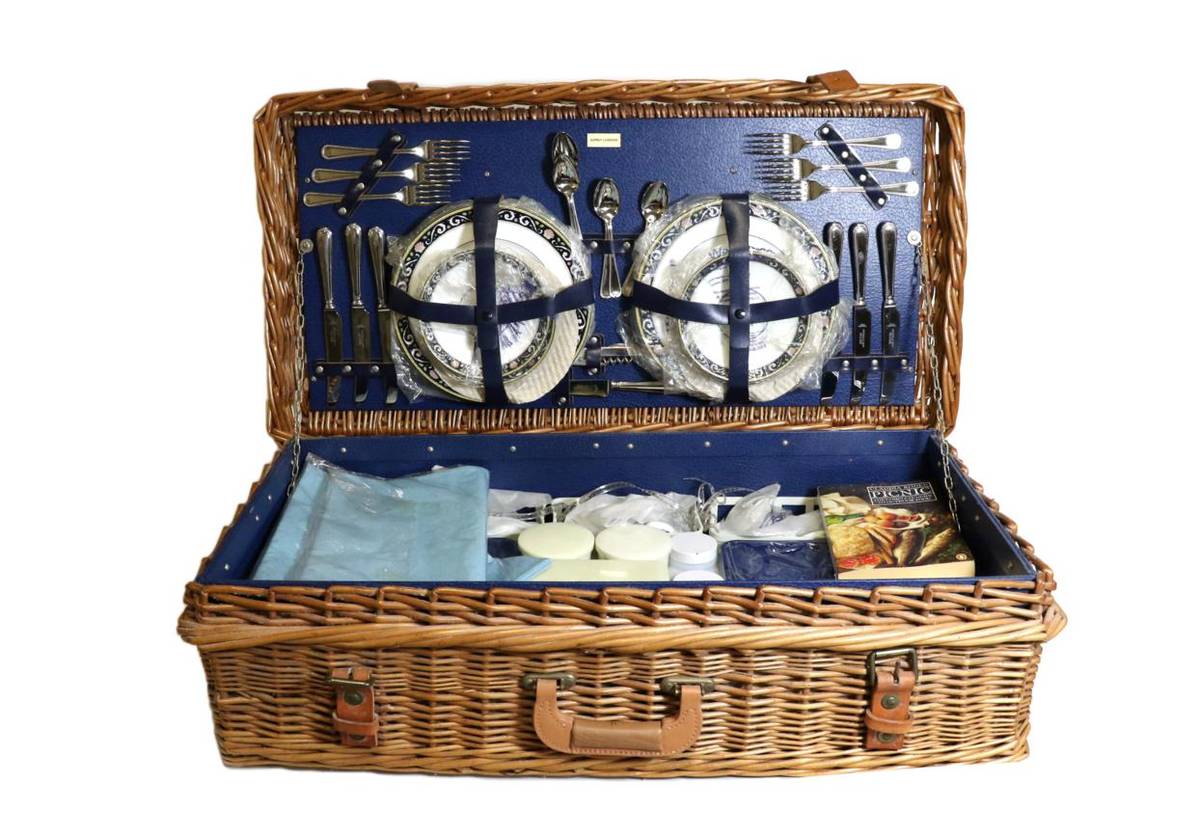 Lot 37 - A Wicker Picnic Set, labelled Asprey of London, in unused condition, comprising a six place...
