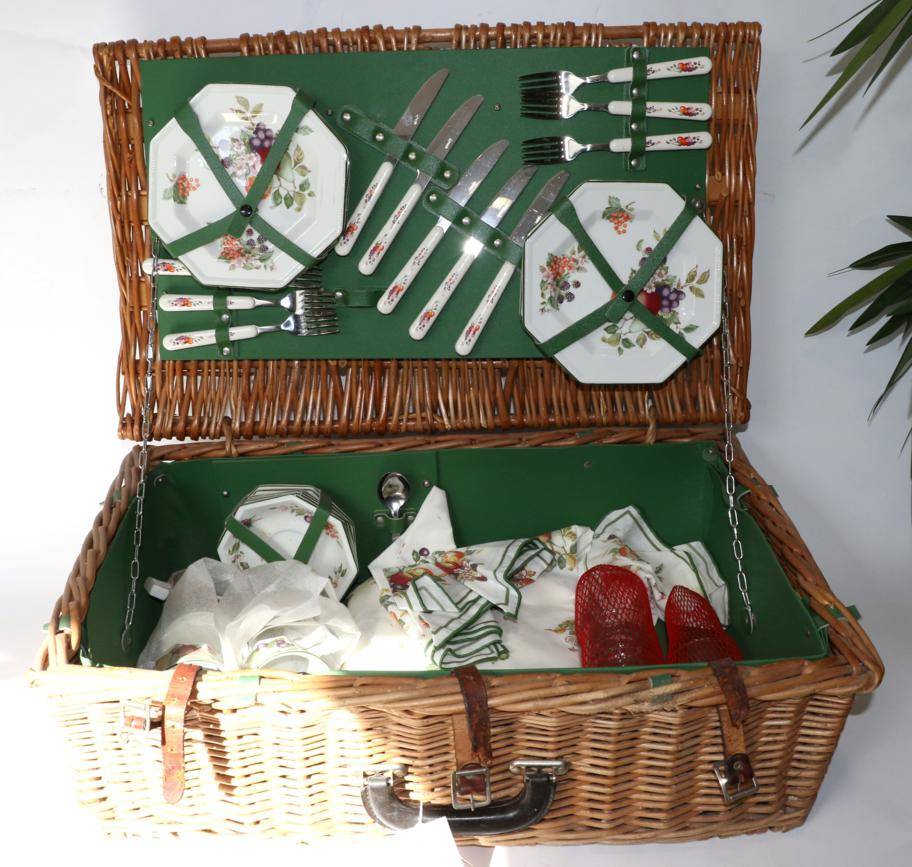 Lot 51 - A Wicker Picnic Set, containing a six place fruit decorated tea service comprising six...