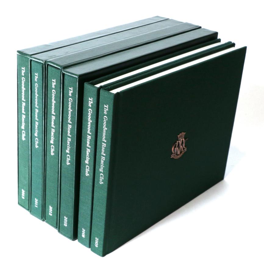 Lot 117 - Goodwood Road Racing Club: Nine Hardback Volumes, 2008-2016 inclusive, each cover embellished...