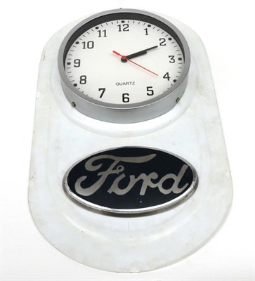 Lot 192 - A Ford Enamel Advertising Sign, with oval Ford emblem and a later quartz movement clock, 53cm...