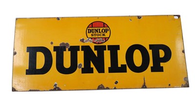 Lot 202 - A Dunlop Single-Sided Advertising Sign, with black lettering on a yellow ground Dunlop Stock...