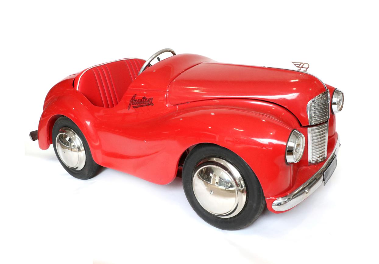 Lot 256 - A Fine Pedal Car of an Austin A40 Car, painted red with chrome grille, headlamps, bumper and...