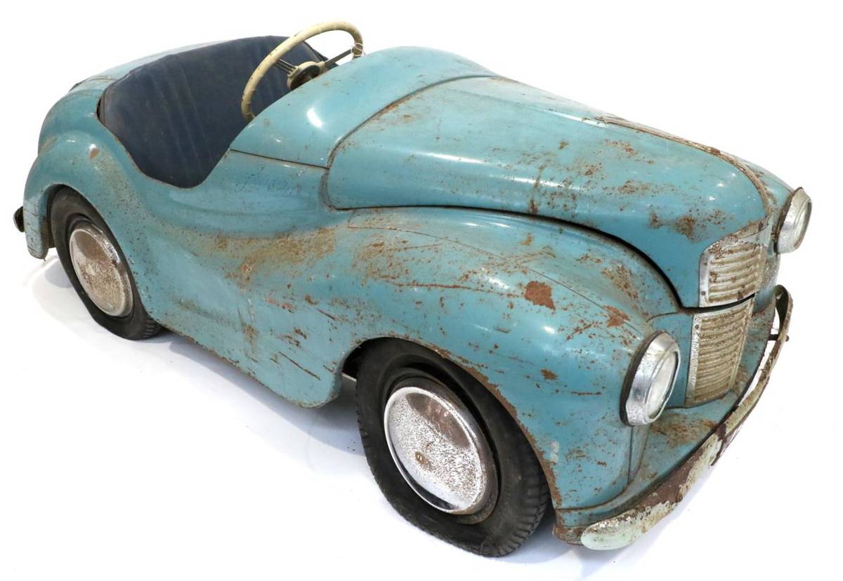 Lot 260 - An Austin J40 Vintage Pedal Car, circa 1950, painted blue with blue padded seat, it has an...