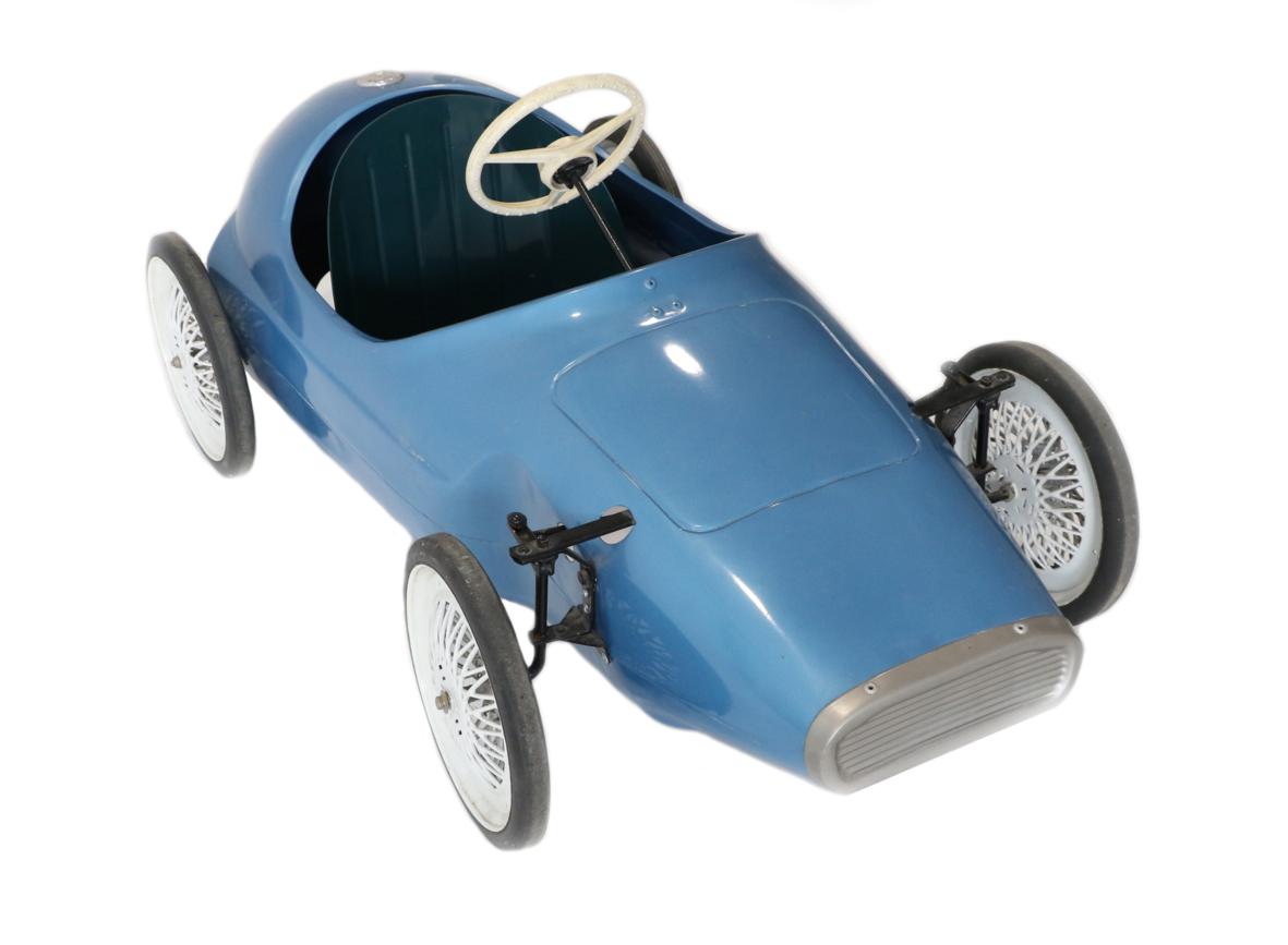 Lot 262 - A Triang Vintage Pedal Car modelled as a 1960's Grand Prix Racing Car, painted blue with green...