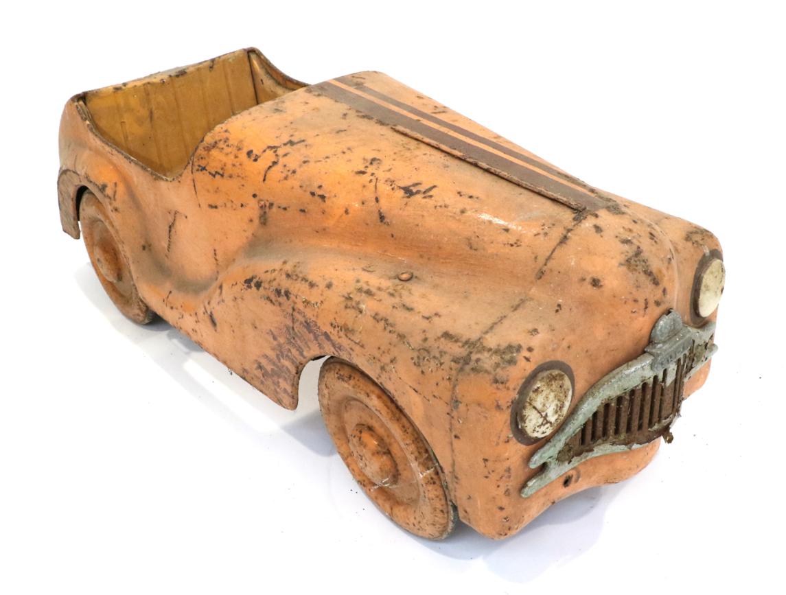 Lot 264 - A Triang ";Centurion"; 1950's Style Pedal Car, painted orange, plastic steering wheel detached...
