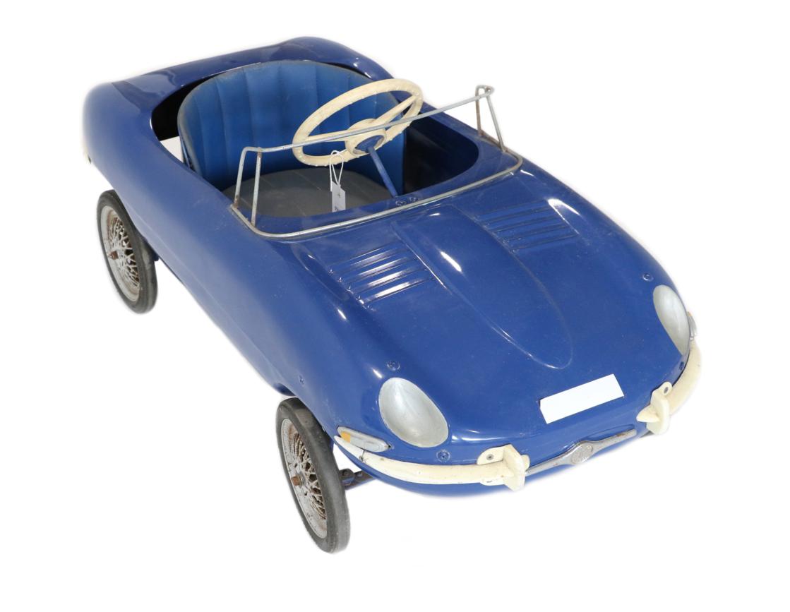 Lot 268 - A Triang Vintage Pedal Car modelled as a Jaguar E-Type, pained blue, with tub shape leather...