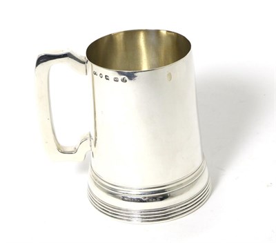 Lot 8 - A Victorian Silver Mug, Frederick Elkington, Birmingham 1874, plain slightly tapering form with...