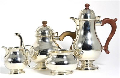 Lot 21 - A Silver Four Piece Tea Service, William Comyns, London 1940, plain baluster form, the covers...