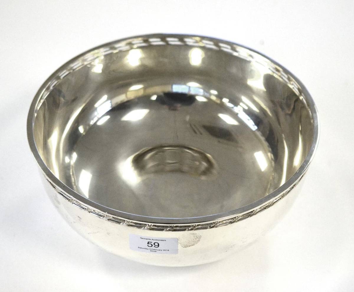 Lot 59 - A Large Silver Bowl, A E Jones, Birmingham 1990, with foliate pierced rim and foot, 24.5cm...