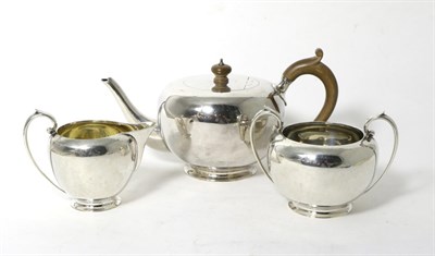 Lot 67 - A Three Piece Silver Tea Service, Nayler Bros, London 1946, of plain spherical form, the teapot...