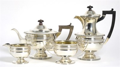Lot 74 - A George V Silver Four Piece Tea Service, Martin Hall & Co Sheffield 1919, circular with...
