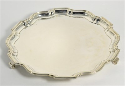 Lot 86 - A Large Shaped Circular Silver Salver, Barker Brothers, Birmingham 1932, standing on three...