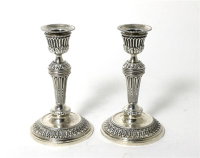 Lot 119 - A Pair of Modern Cast Silver Candlesticks, maker's mark WW, London 2000, in the French taste,...