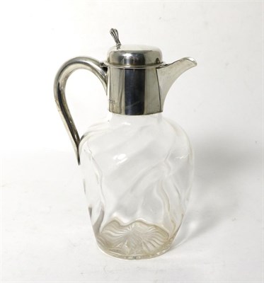 Lot 120 - An Edwardian Silver Mounted Glass Claret Jug, William Comyns, London 1905, the dimpled square...