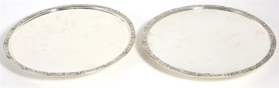 Lot 134 - A Pair of Silver Plates, Wakely & Wheeler, London 1943/45, with Celtic knot border, standing on...