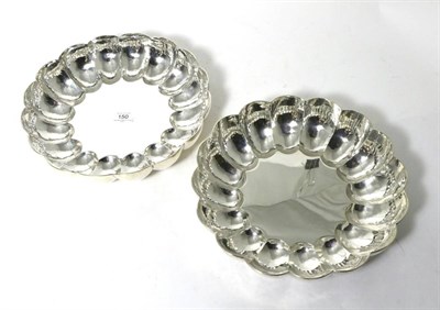 Lot 150 - A Matched Pair of Large Silver Bowls, marks of Reid & Sons and William Comyns, London 1968,...