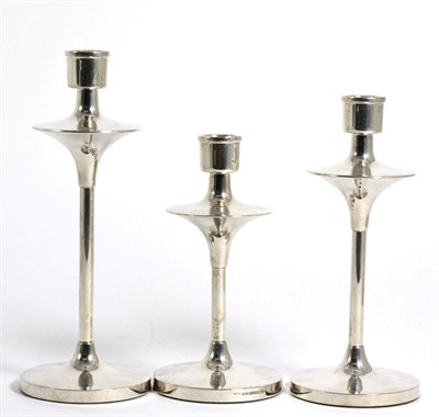 Lot 153 - A Graduated Set of Three Contemporary Silver Candlesticks, B&Co., Birmingham 2007, the largest...