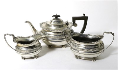 Lot 163 - A George V Silver Three Piece Tea Service, Nathan & Hayes, Chester, 1915, oval with shell and...
