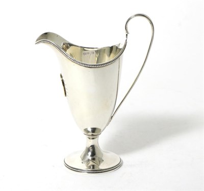 Lot 166 - A George III Pedestal Silver Cream Jug, John Denzilow, London 1786, with bead borders and...