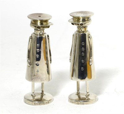 Lot 205 - A Pair of Novelty Silver Chauffeur Salt and Pepper Pots, maker's mark WW, London 2003, modelled...