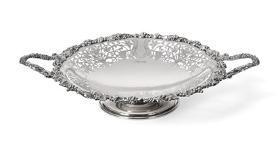 Lot 219 - A Twin Handled Silver Pedestal Dish, Walker & Hall, Sheffield 1930, with ornate fruiting vine...