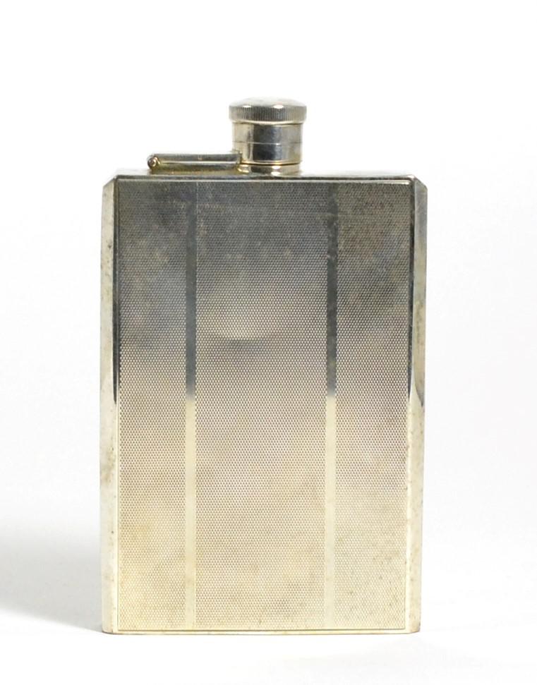 Lot 250 - An Engine Turned Silver Hip Flask, Charles S Green & Co, Birmingham 1947, rectangular with...