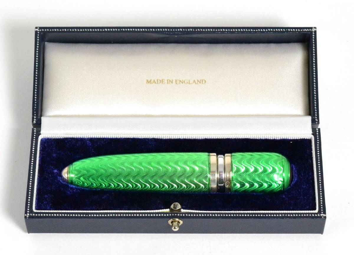 Lot 251 - A Modern Silver and Green Guilloche Enamel Travelling Perfume Dispenser, maker's mark FGK,...