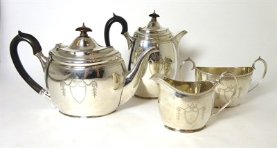 Lot 313 - A matched four piece silver tea service, Pearce & Sons, London 1905 and Fattorini & Sons, Sheffield