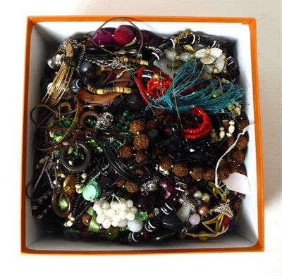 Lot 318 - A good selection of costume jewellery, including beaded necklaces, bangles and brooches,...