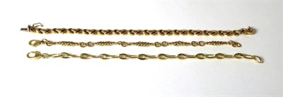 Lot 326 - Three 9 carat gold fancy link bracelets, lengths 18cm, 18.5cm and 19cm (3)
