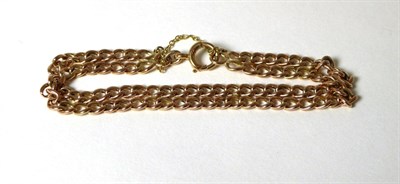 Lot 333 - A two row curb link bracelet, length 20cm