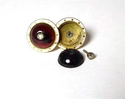 Lot 359 - A pair of garnet and diamond earrings, a round cabocon garnet inset with an old cut diamond, to...