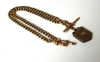 Lot 366 - A 9 carat gold Albert with a t-bar and clips, suspending a locket, length 40cm
