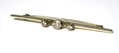Lot 369 - An old cut diamond bar brooch, graduated diamonds to a tapering bar, total estimated diamond weight