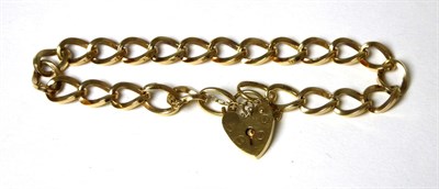 Lot 379 - A 9 carat gold curb link bracelet, length 19.5cm