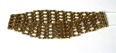 Lot 394 - A 9 carat gold brick link bracelet, length 19cm