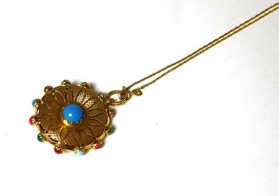 Lot 395 - A multi-gemstone set pendant, measures 3cm in diameter, stamped '750', on chain