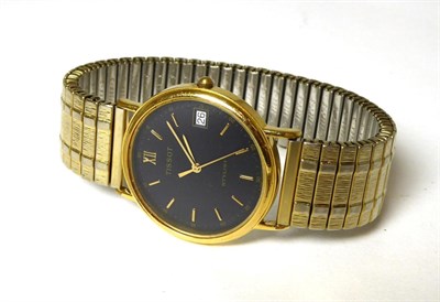 Lot 400 - A gold plated calendar centre seconds wristwatch, signed Tissot, with Tissot box and booklet